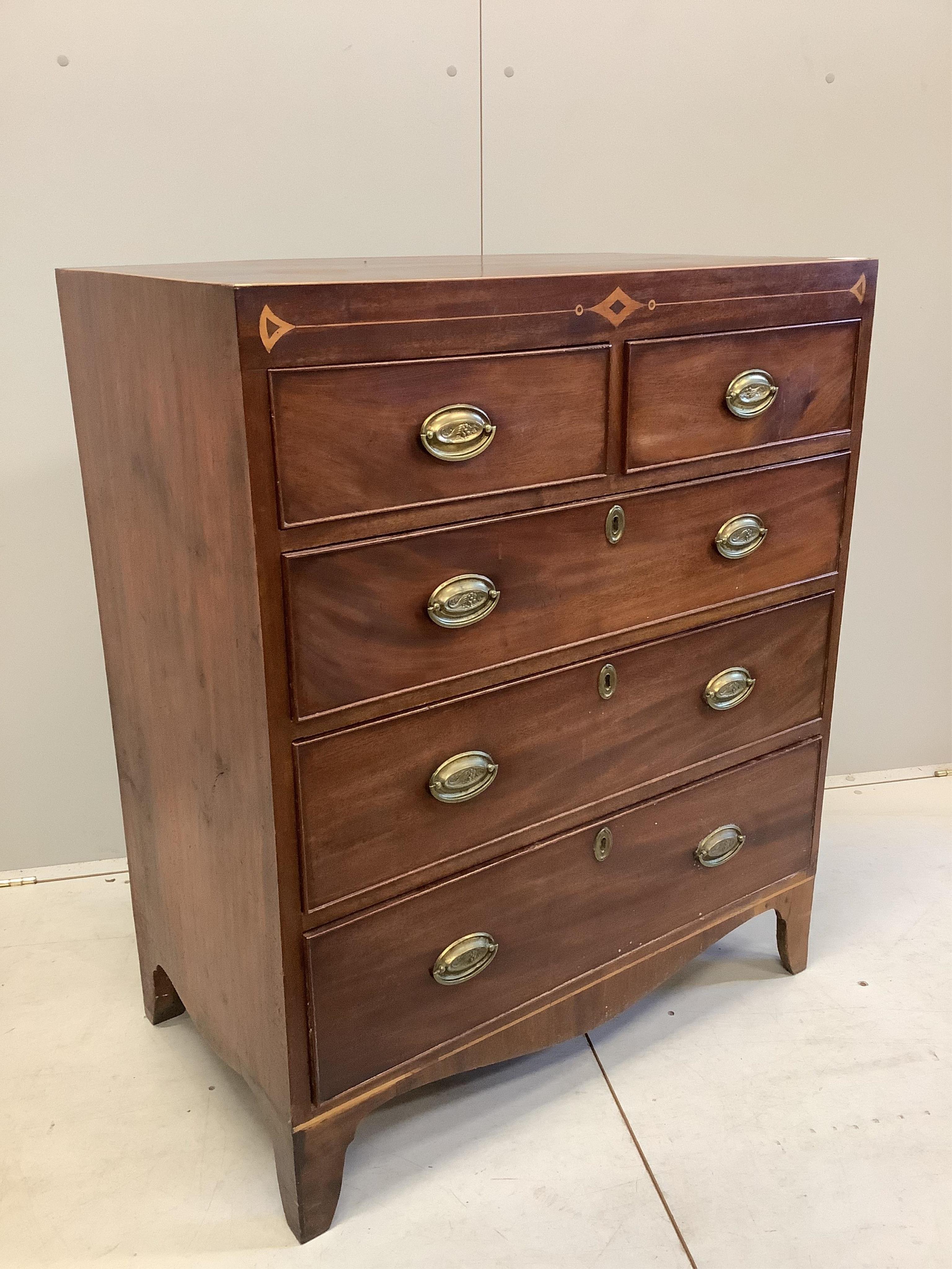 A Regency inlaid mahogany chest, width 87cm, depth 50cm, height 106cm. Condition - fair, top slightly faded, spot and ring marked.